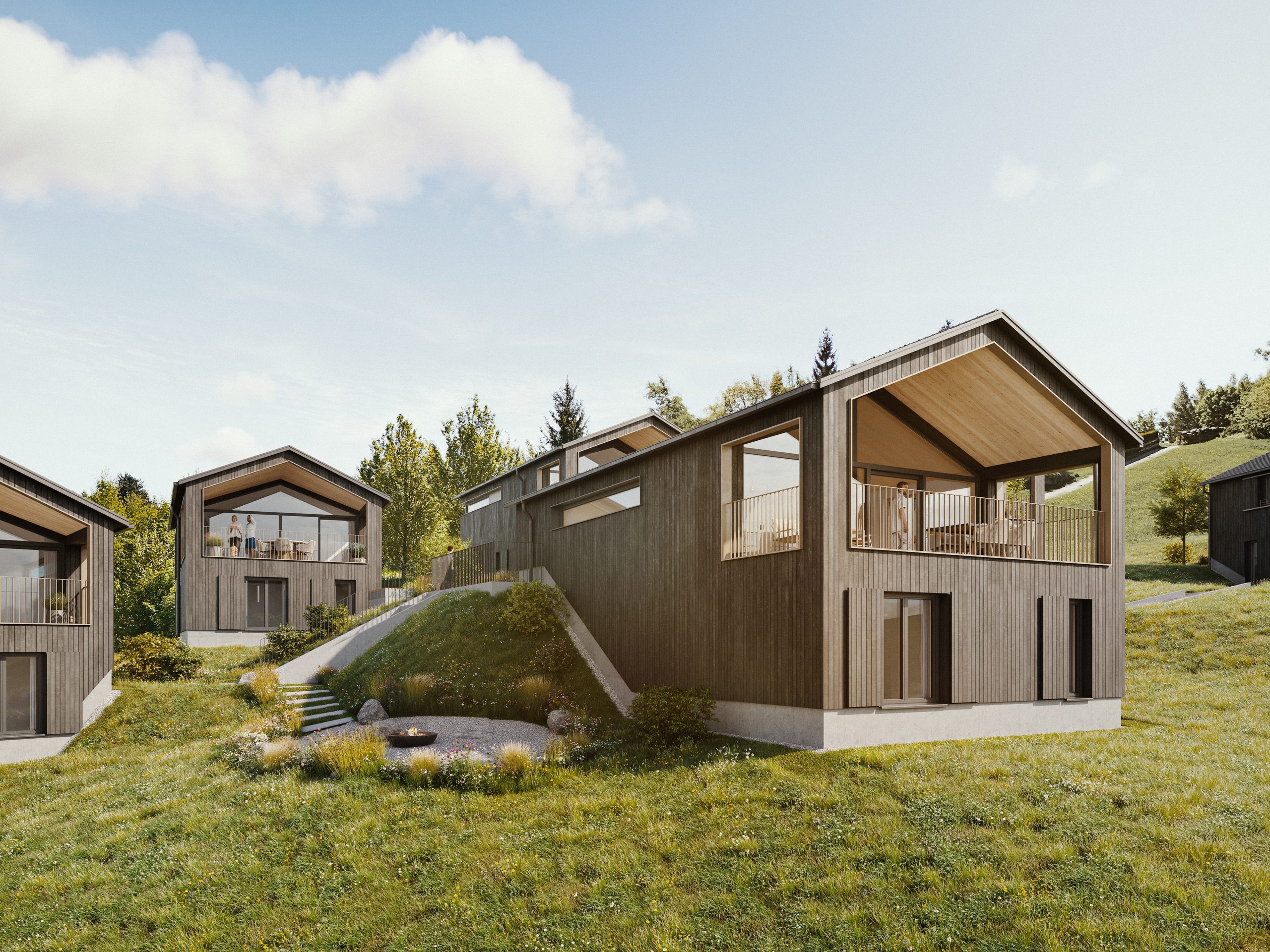 Zwei Bergchalets in moderner Holzbauweise am Hang mit begrüntem Dach